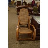 MODERN BENTWOOD CANE SEATED AND BACK ROCKING CHAIR