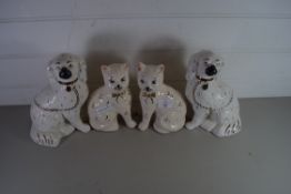 PAIR OF STAFFORDSHIRE DOGS TOGETHER WITH A FURTHER PAIR OF STAFFORDSHIRE TYPE CATS