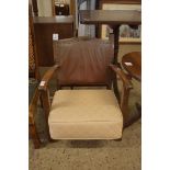 EARLY 20TH CENTURY LOW ARMCHAIR WITH LEATHER UPHOLSTERED BACK