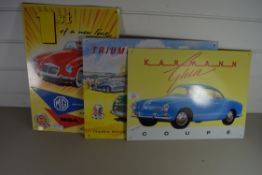 THREE REPRODUCTION CAR ADVERTISING METAL PICTURES - TRIUMPH TR3, CARMAN GHIA COUPE AND AN MG (3)