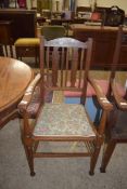 EARLY 20TH CENTURY OAK FRAMED CARVER CHAIR WITH FLORAL UPHOLSTERED SEAT, 102CM HIGH