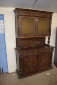 LATE 19TH CENTURY CONTINENTAL OAK SIDE CABINET WITH TOP SECTION WITH TWO GLAZED DOORS OVER A BASE