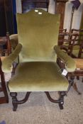 LARGE 19TH CENTURY GREEN UPHOLSTERED ARMCHAIR ON TURNED HARDWOOD FRAME WITH X-FORMED STRETCHER,