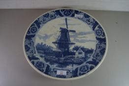 20TH CENTURY DELFT WALL CHARGER DECORATED WITH A WINDMILL