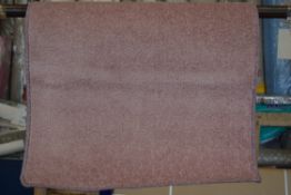 Tufted light pink rug, 67 x 120cm