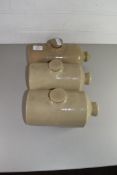 THREE STONEWARE HOT WATER BOTTLES