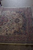 20TH CENTURY WOOL FLOOR RUG DECORATED WITH A LARGE CENTRAL PANEL WITH FLORAL DETAIL ON A PALE