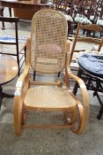 MODERN BENTWOOD CANE SEATED AND BACK ROCKING CHAIR