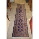 MODERN WOOL FLOOR RUNNER DECORATED WITH CENTRAL MEDALLIONS ON A BLUE BACKGROUND, 250CM LONG