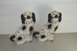 TWO 19TH CENTURY STAFFORDSHIRE MODEL SPANIELS