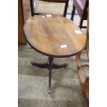 SMALL OVAL TOPPED MAHOGANY WINE TABLE ON TURNED COLUMN AND TRIPOD BASE WITH BRASS END CAPS AND