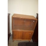 RETRO TEAK GLAZED DISPLAY CABINET AND ANOTHER WITH SOLID DOORS, 71CM WIDE