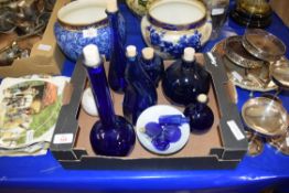 COLLECTION OF BLUE GLASS BOTTLES AND SCENT BOTTLES TOGETHER WITH A FURTHER MACINTYRE VESTA STAND