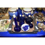 COLLECTION OF BLUE GLASS BOTTLES AND SCENT BOTTLES TOGETHER WITH A FURTHER MACINTYRE VESTA STAND