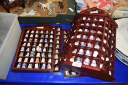 FOUR WALL CABINETS CONTAINING LARGE COLLECTION OF THIMBLES