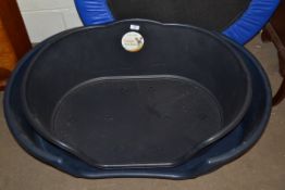 TWO MOULDED PLASTIC DOG BEDS