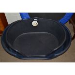 TWO MOULDED PLASTIC DOG BEDS