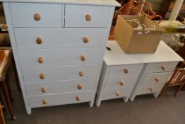 MODERN CREAM PAINTED SEVEN DRAWER CHEST AND PAIR OF MATCHING BEDSIDE CABINETS, LARGEST PIECE 110CM
