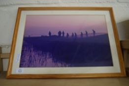 COLOURED PHOTOGRAPHIC PRINT OF FIGURES IN A MARSHLAND SETTING, FRAMED AND GLAZED