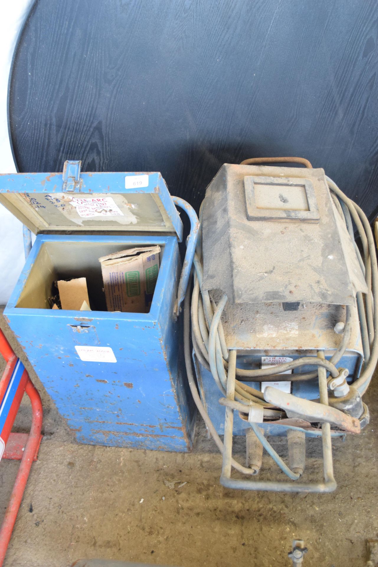 METAL STORAGE BOX CONTAINING A LARGE QTY OF WELDING RODS AND A LYTE-ARC ARC WELDER