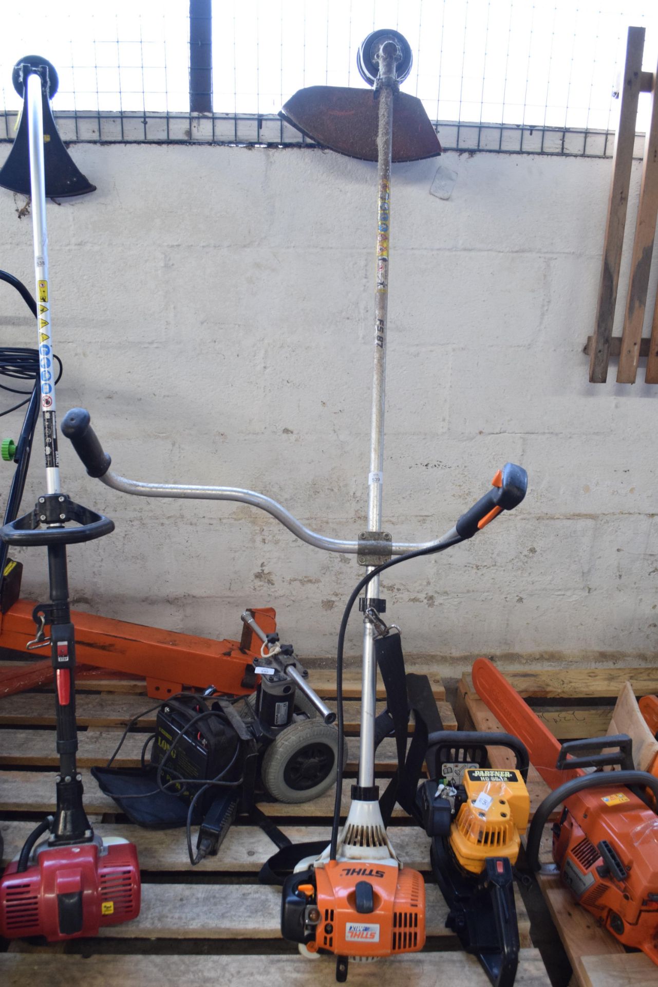 STIHL FS87 PETROL STRIMMER WITH TWO PPE HELMETS