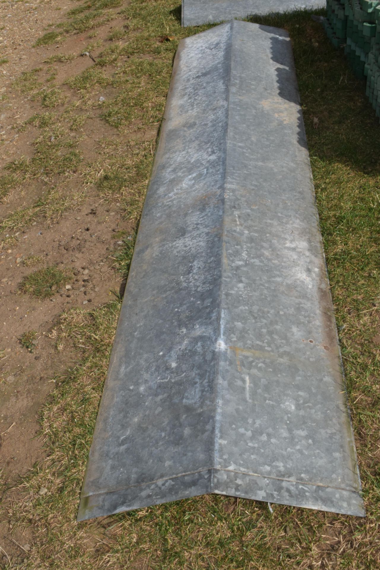 2 GALVANISED RIDGE CAPS APPROX 500X2400MM