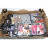 SONY PLAYSTATION AND ASSORTED GAMES