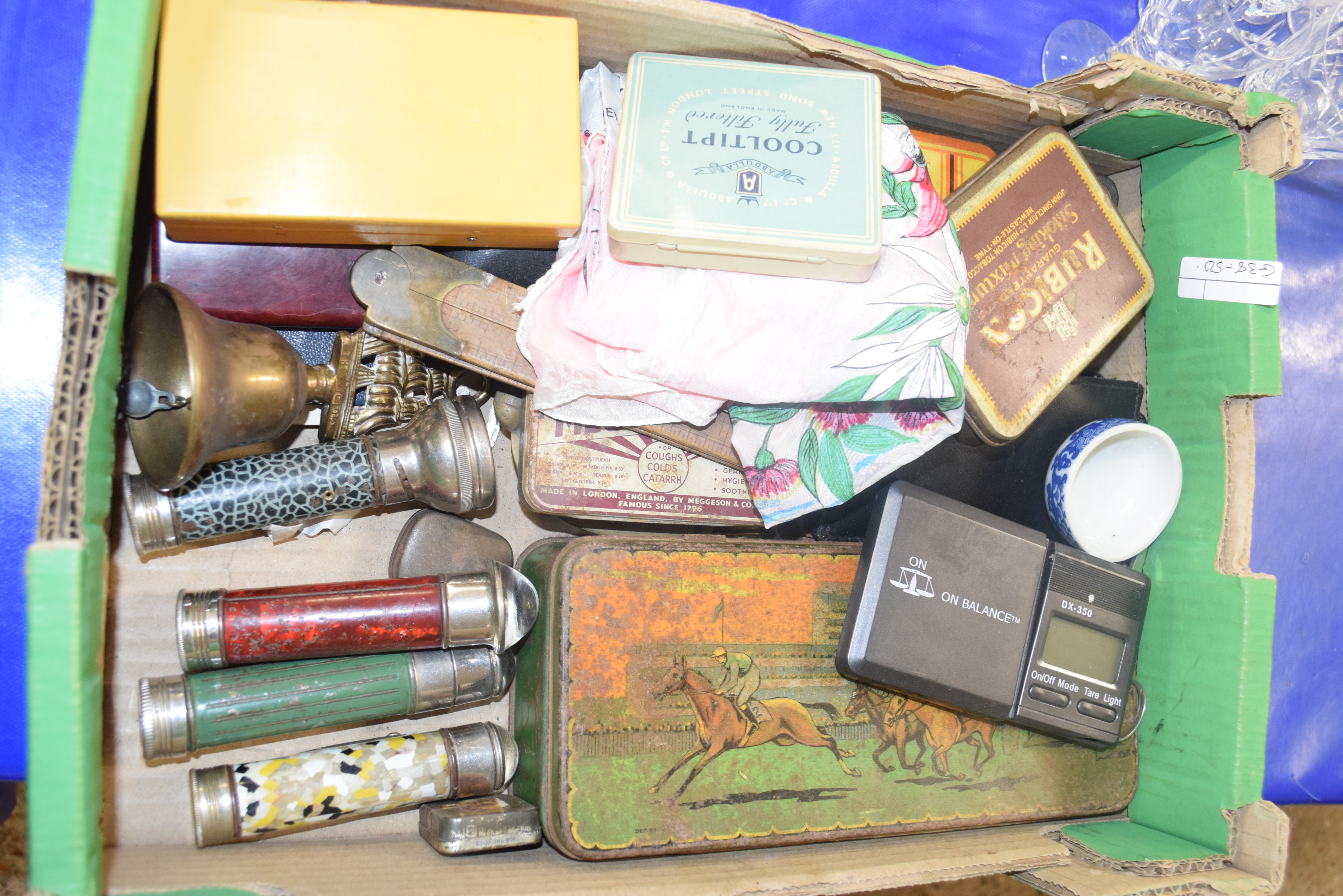 BOX OF VINTAGE ADVERTISING TINS, SMALL ELECTRIC SCALES, VINTAGE TORCHES ETC