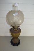 LATE VICTORIAN OIL LAMP WITH FROSTED GLASS GLOBE SHADE, COPPER VASE FORMED BODY AND CIRCULAR BASE