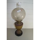 LATE VICTORIAN OIL LAMP WITH FROSTED GLASS GLOBE SHADE, COPPER VASE FORMED BODY AND CIRCULAR BASE