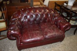 RED LEATHER TWO-SEATER CHESTERFIELD SOFA, 148CM WIDE