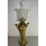 VICTORIAN OIL LAMP WITH FROSTED FLORAL DECORATED SHADE AND BRASS VASE FORMED BODY SET ON A HEXAGONAL