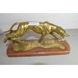 POLISHED BRASS MODEL OF A GREYHOUND ON HARDWOOD PLINTH BASE