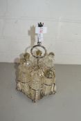 MAPPIN & WEBB SILVER PLATED SIX BOTTLE CRUET STAND WITH ACCOMPANYING CLEAR GLASS BOTTLE