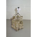 MAPPIN & WEBB SILVER PLATED SIX BOTTLE CRUET STAND WITH ACCOMPANYING CLEAR GLASS BOTTLE