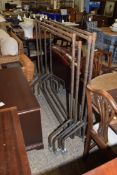 FOUR METAL SHOP DISPLAY CLOTHES RAILS ON WHEELS