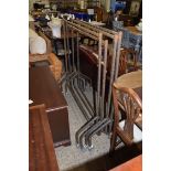 FOUR METAL SHOP DISPLAY CLOTHES RAILS ON WHEELS