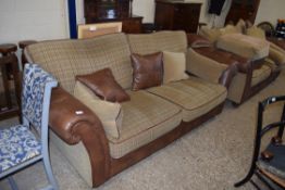 PAIR OF MODERN BROWN LEATHER AND FABRIC COVERED THREE SEATER SOFAS AND ACCOMPANYING FOOT STOOL