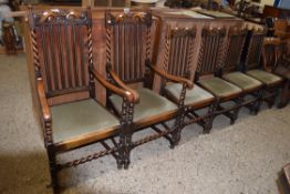 SET OF SIX EARLY 20TH CENTURY OAK BARLEY TWIST FRAMED DINING CHAIRS COMPRISING TWO CARVERS AND