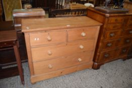 20TH CENTURY PINE CHEST OF TWO SHORT AND TWO LONG DRAWERS WITH TURNED KNOB HANDLES, 106CM WIDE