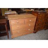 20TH CENTURY PINE CHEST OF TWO SHORT AND TWO LONG DRAWERS WITH TURNED KNOB HANDLES, 106CM WIDE