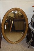 OVAL BEVELLED WALL MIRROR SET IN GILT FINISH REEDED FRAME, 85CM WIDE