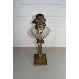 VICTORIAN OIL LAMP WITH CLEAR GLASS FONT AND BRASS CORINTHIAN COLUMN BASE