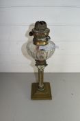 VICTORIAN OIL LAMP WITH CLEAR GLASS FONT AND BRASS CORINTHIAN COLUMN BASE