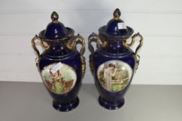 PAIR OF 20TH CENTURY BLUE AND GILT DECORATED VASES WITH INSET PANELS OF FASHIONABLE LADIES