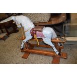 MODERN ROCKING HORSE ON POLISHED HARDWOOD STAND, 100CM HIGH