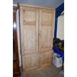 PINE TWO SECTION CUPBOARD WITH FOUR PANELLED DOORS AND SHELVED INTERIOR, 124CM HIGH