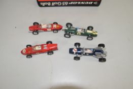 FOUR VINTAGE DINKY AND CORGI RACING CARS