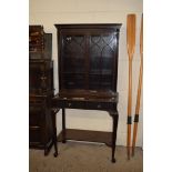 EDWARDIAN MAHOGANY SIDE CABINET WITH GLAZED TOP SECTION OVER A BASE WITH TWO DRAWERS AND A SHELF,