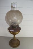 EARLY 20TH CENTURY OIL LAMP WITH FROSTED GLASS SHADE AND BRASS BODY